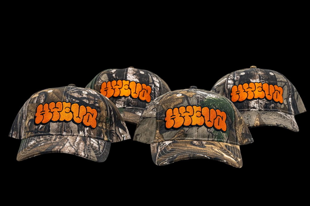 Real Tree Camo Cap with Orange HYEVA Logo