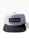 Hyeva Chain Link Bogo Black and White Snapback with white crown, black brim, and chain link logo patch